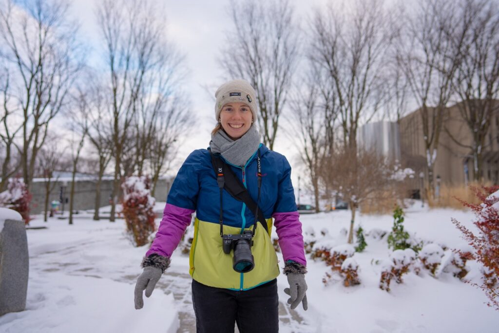 Woman standing in snow in Quebec