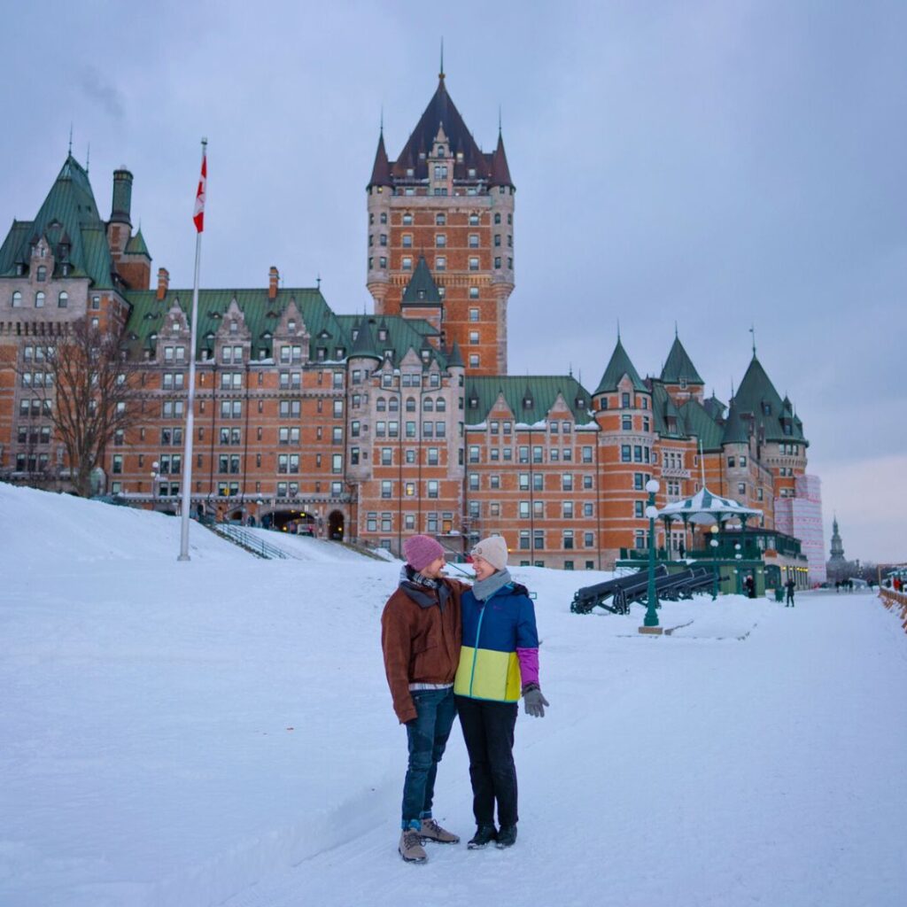 Couple in front of the Chateau Frontenac in Quebec City, Canada (square)