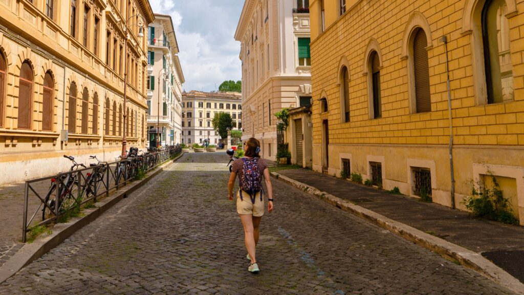 woman walking down street in Rome, Italy