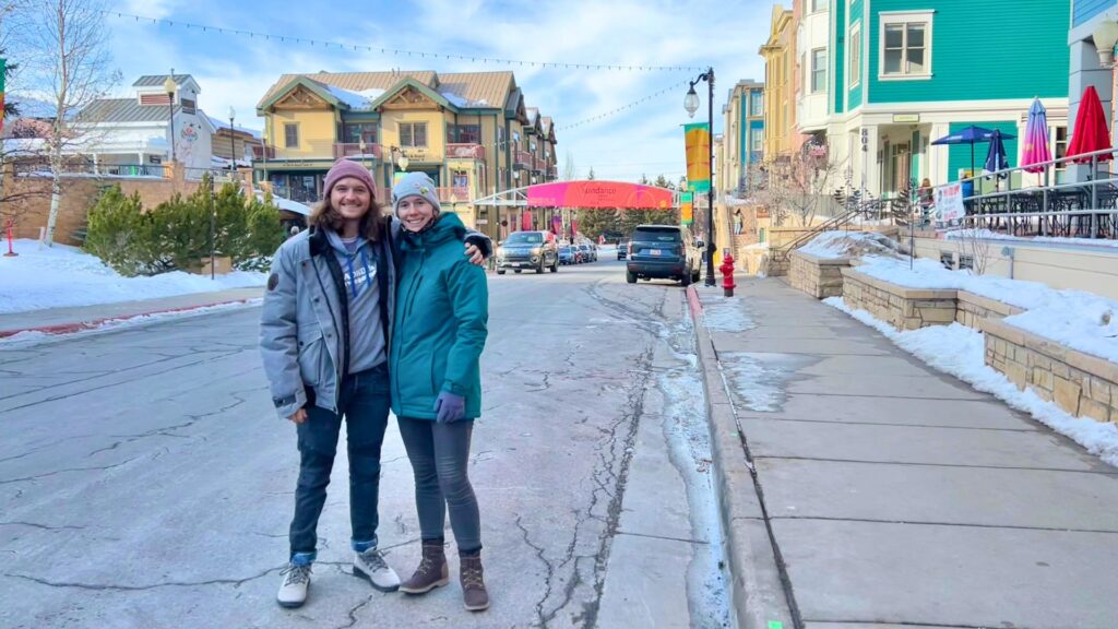 couple in posing in street in downtown Park City