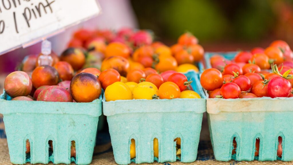 Tomatoes at a Farmers Market - by arinahabich from Getty Images