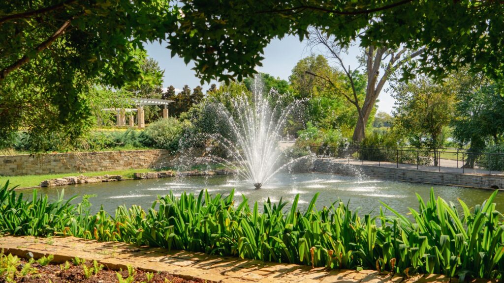 Fountain through trees - Dallas Arboretum