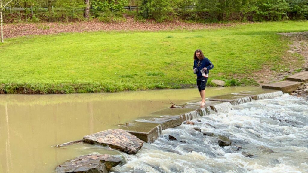 Man crossing creek on Gulpha Gorge Trail, Hot Springs National park