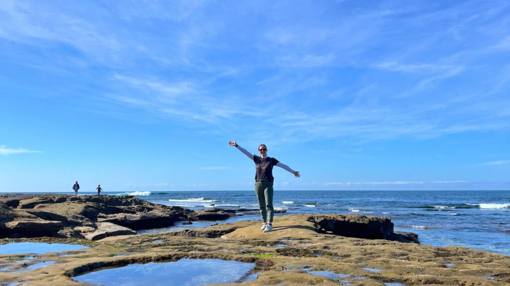 Woman on beach in San Diego La Jolla tide pools