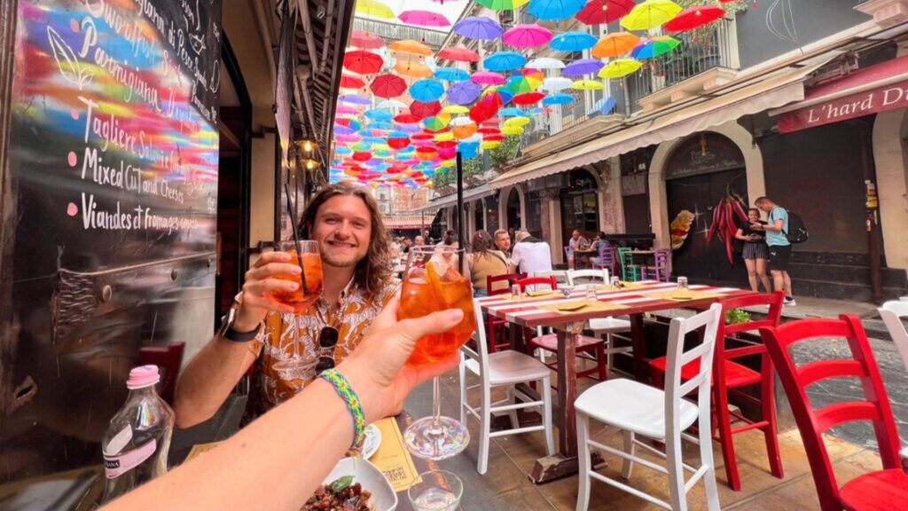 Cheers with two Aperol Spritz in Catania, Sicily