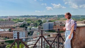 What to Pack for Summer in Italy - woman overlooking Rome