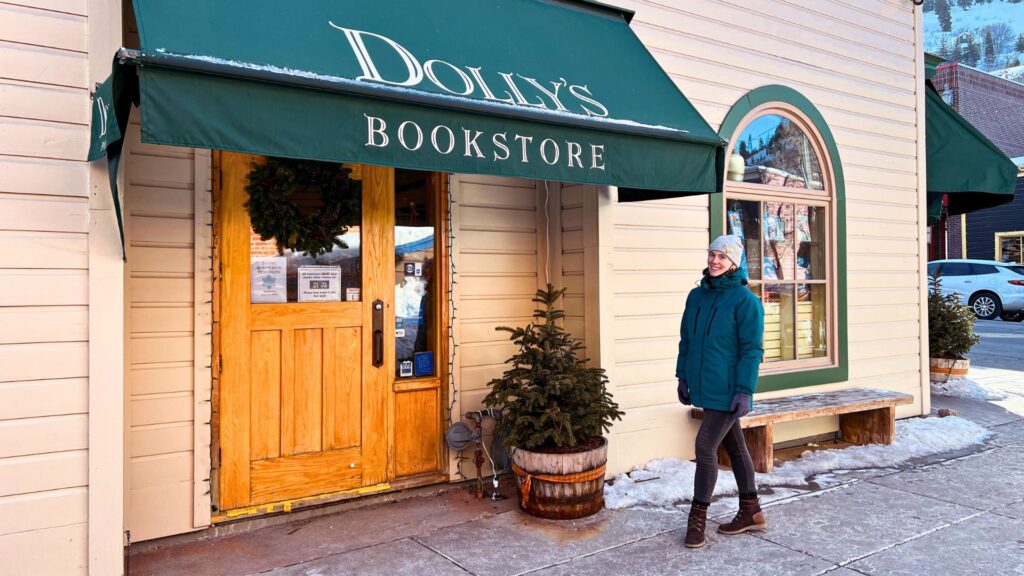 woman outside Dolly's bookstore in Downtown Park City