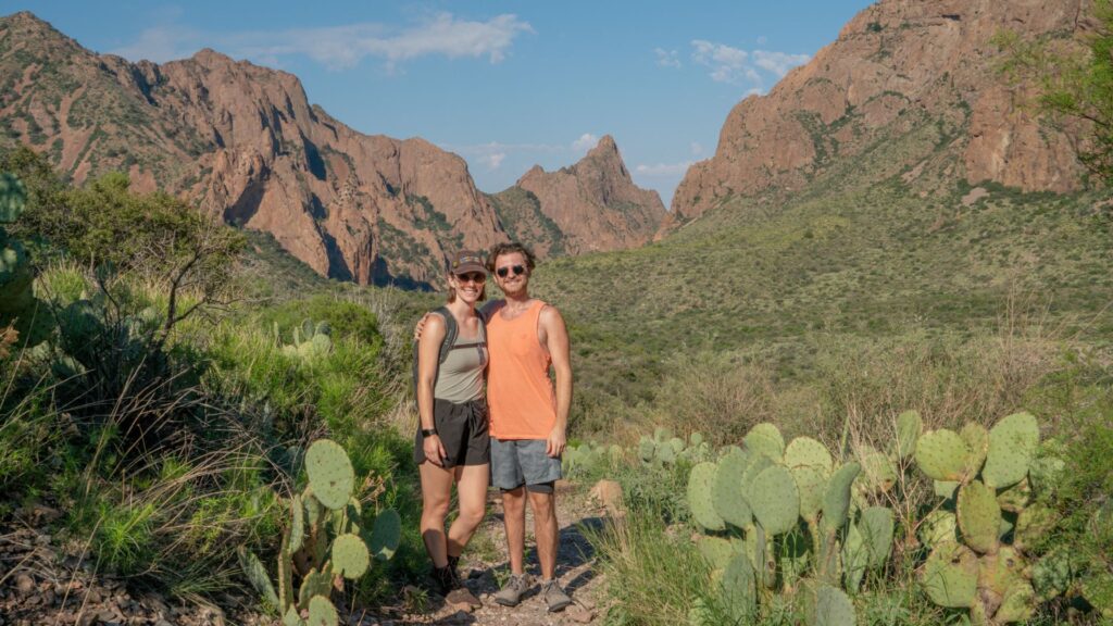 Couple on hiking trail in desert mountains