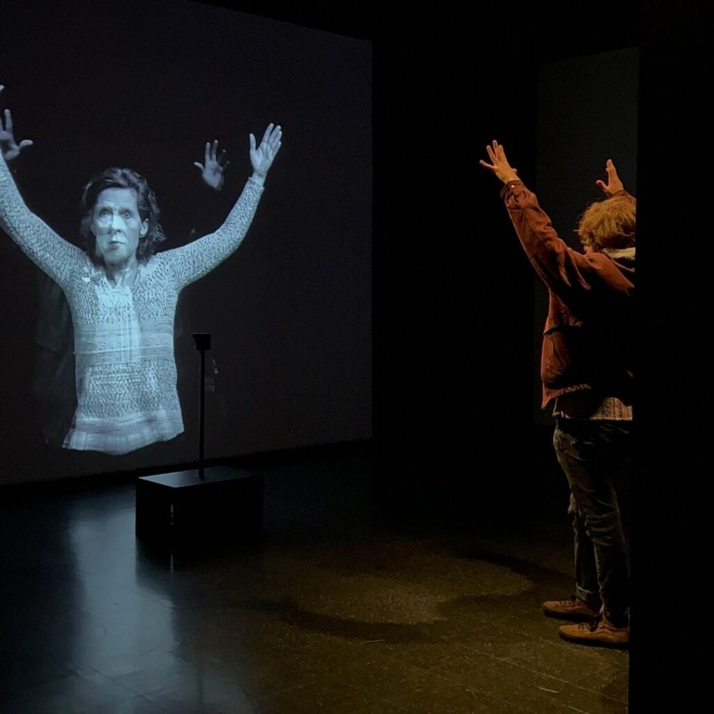 Man in immersive exhibit at Museum of Civilization Quebec City