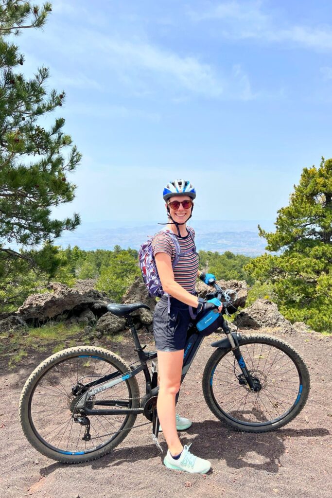 Standing with mountain bike Mount Etna Sicily