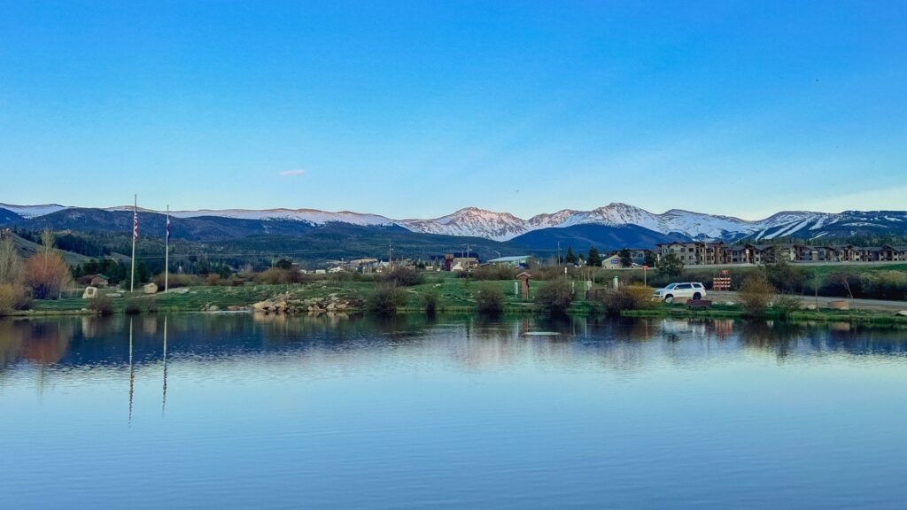 Mountains across a pond in Winter Park, Colorado