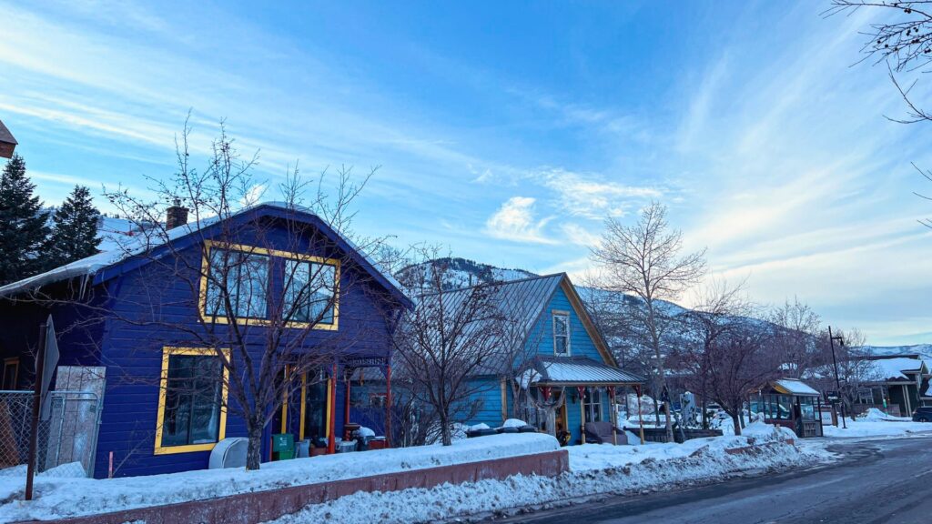 Blue houses in Park City Utah in snow