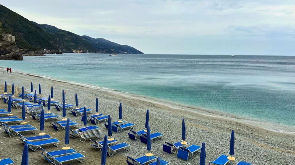 Chairs on the beach in Monterosso Cinque Terre Italy