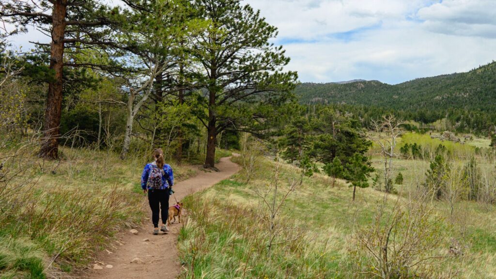 Woman and dog hiking - Dallas to Denver Road Trip