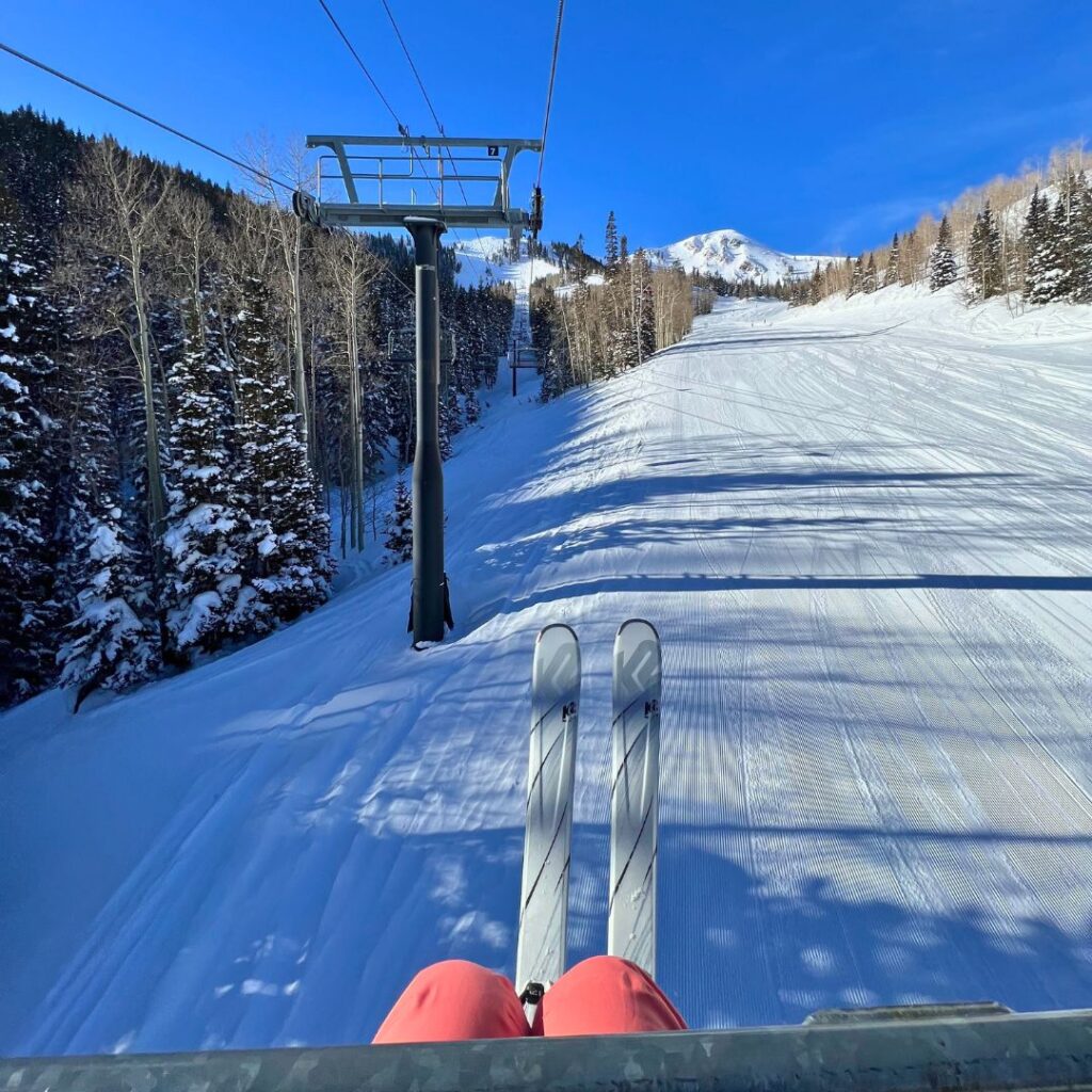 View of a ski run from a ski lift