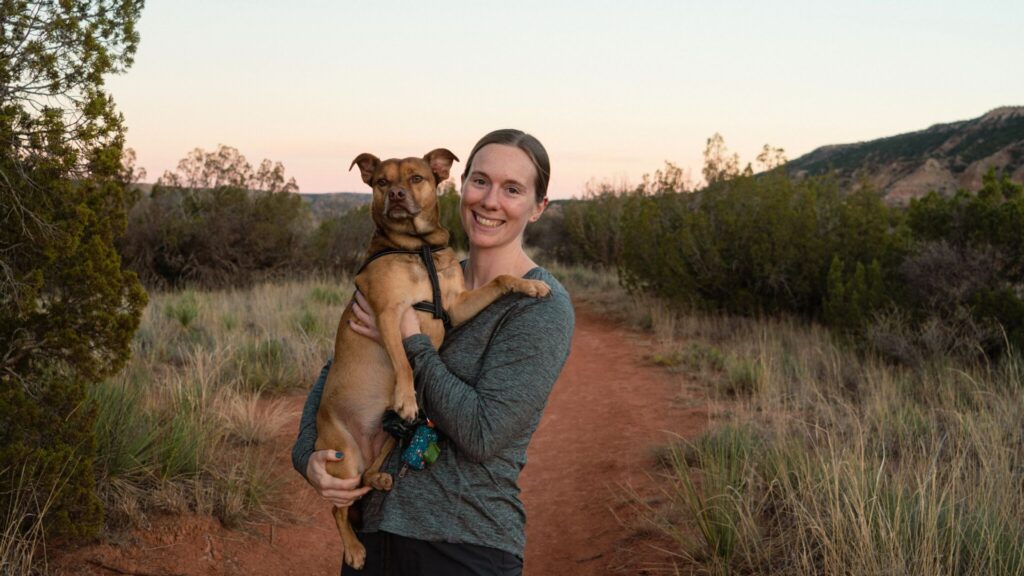 Woman and dog hiking in Palo Duro Canyon Texas