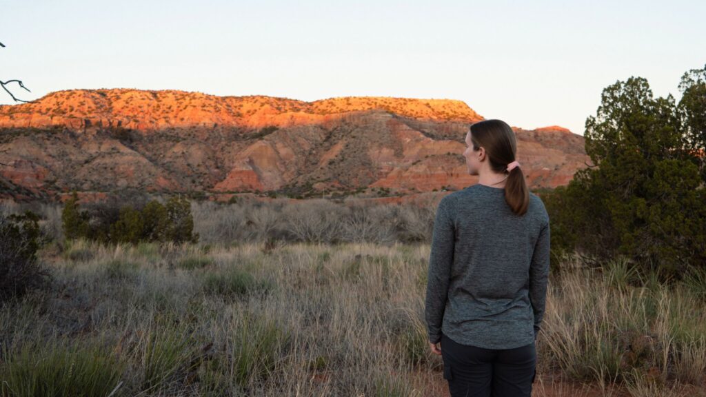 Woman watching the sunset in Palo Duro Canyon State Park