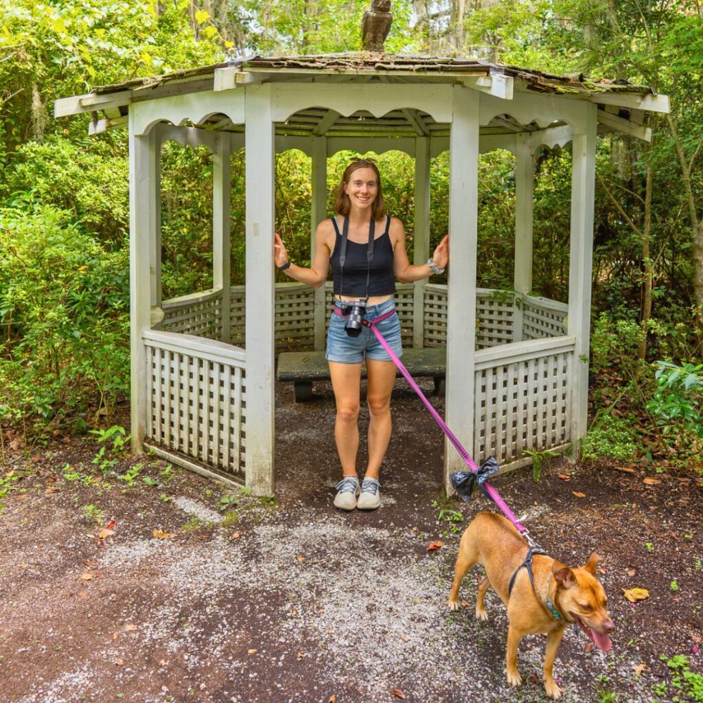 Woman and dog in botanic garden