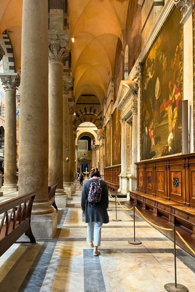 Woman walking in Cathedral in Florence Italy