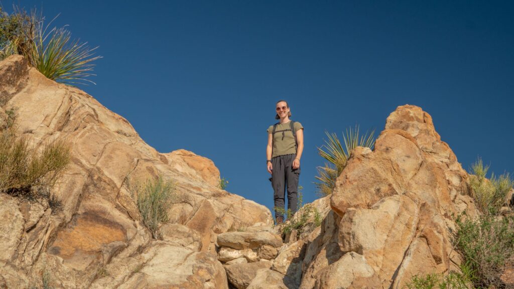 Hiker on a boulder Big Bend National Park