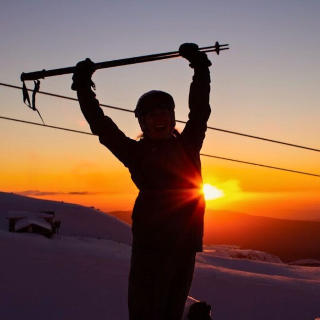 Silhouette of a Skier at Sunset