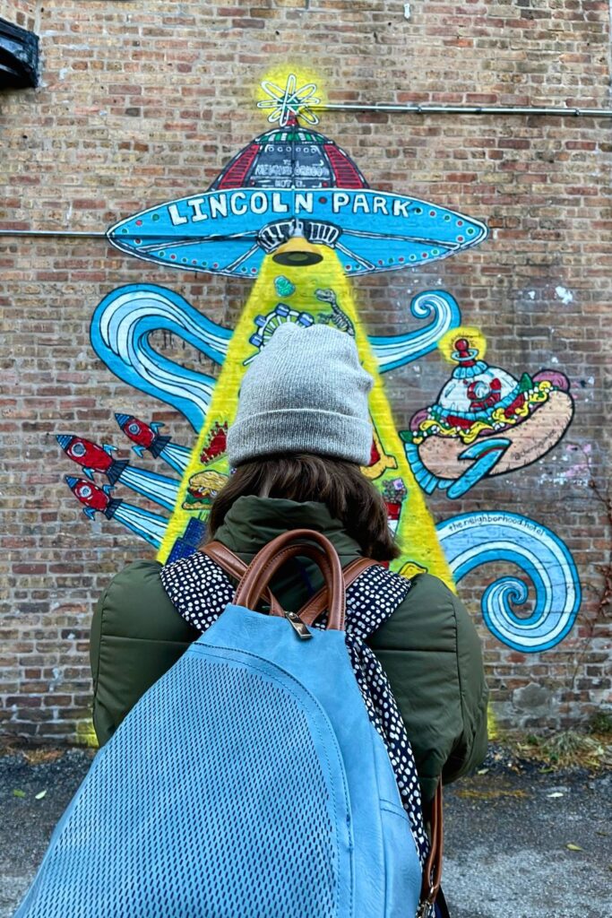 Standing in front of a Lincoln Park mural in Chicago (me)