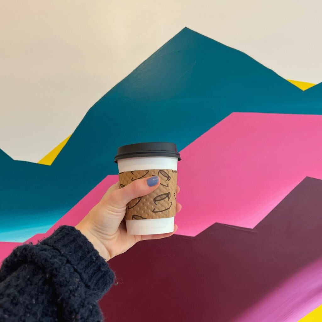 District Coffee Co Latte and Wall Art