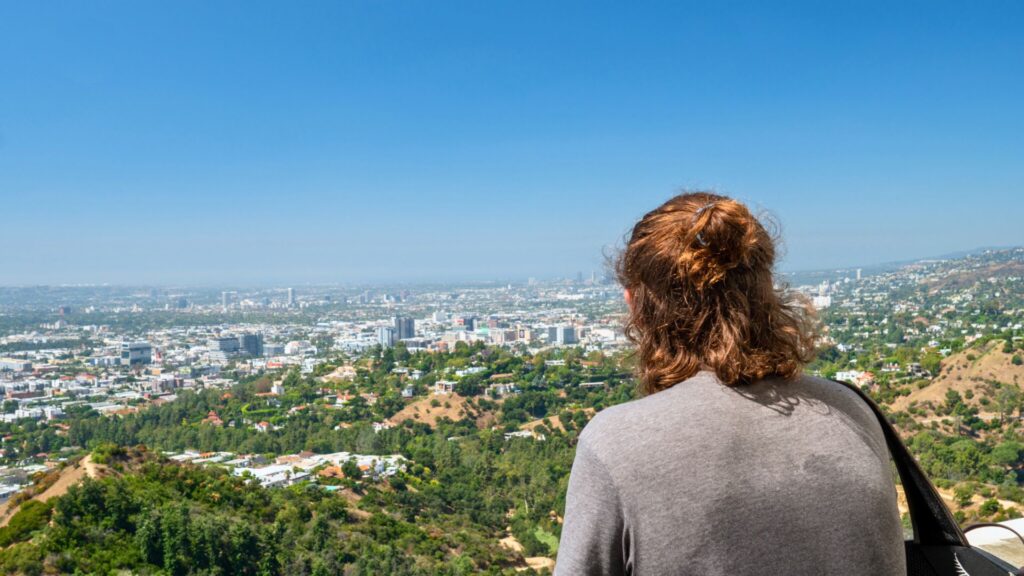 Man admiring the view from Mt Hollywood Los Angeles