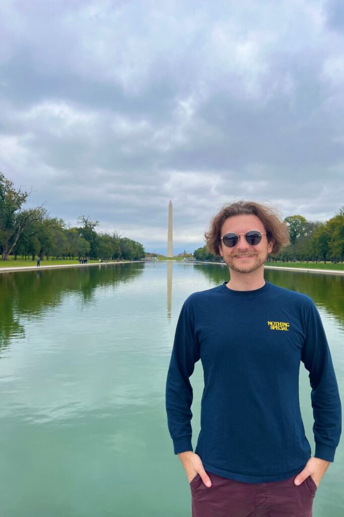 Man in front of Lincoln Reflecting Pool (DC)