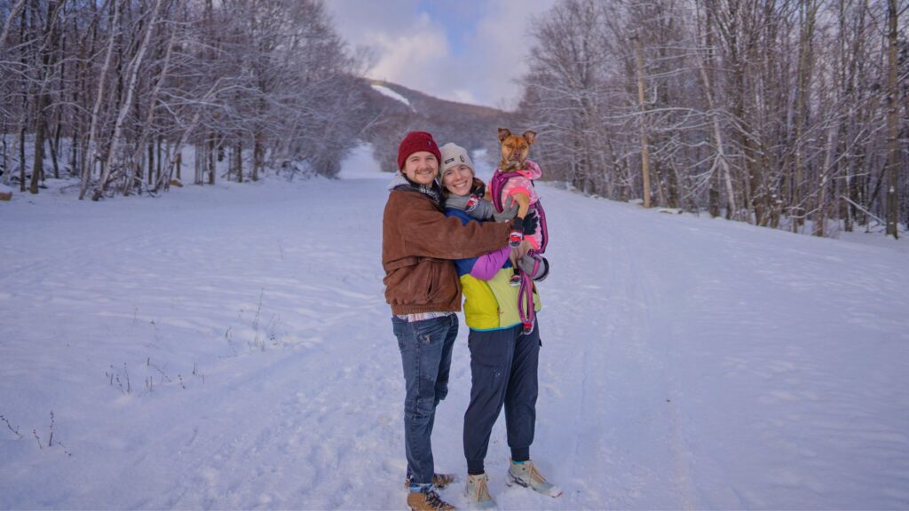 Couple and their dog in Beaupre Quebec in the snow