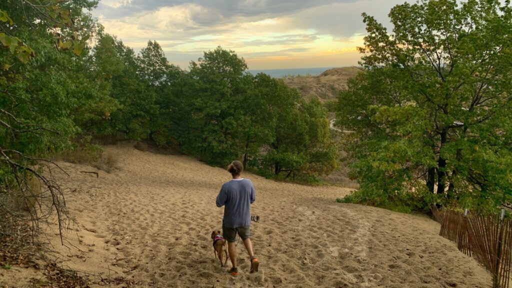 Nate and JoJo hiking in Indiana Dunes