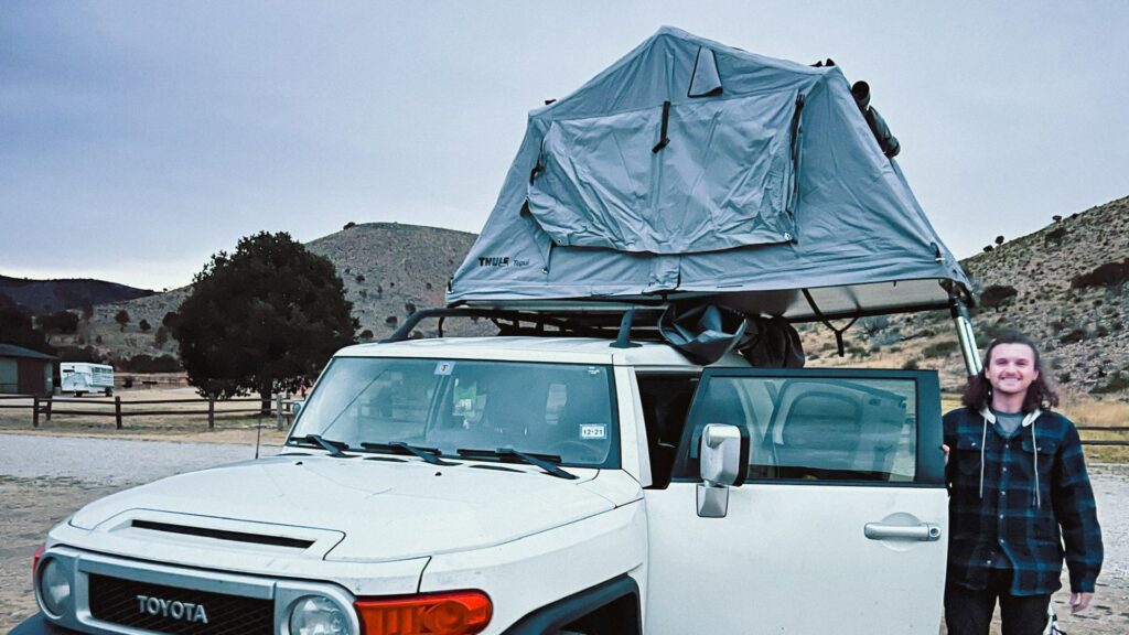 Man and Rooftop Ten - Camping in Winter