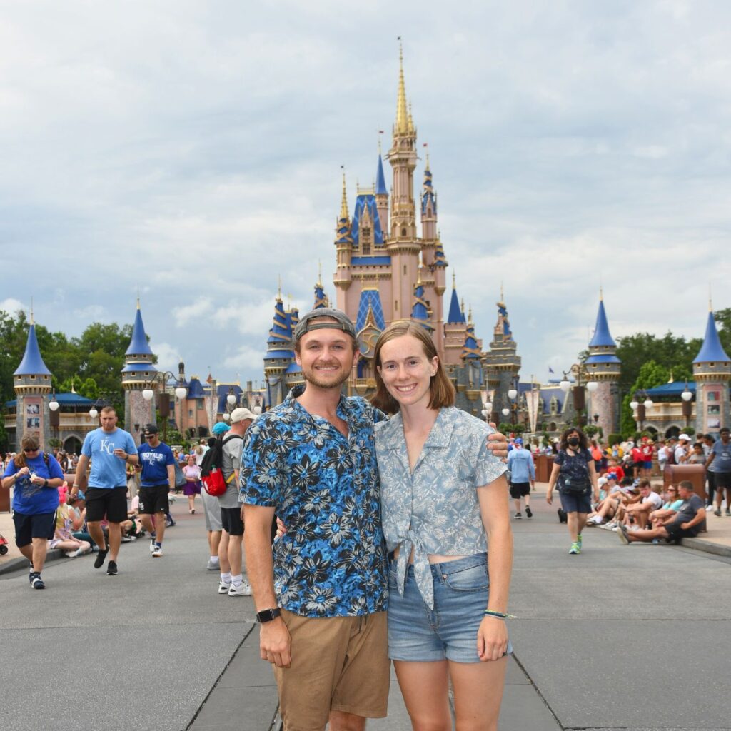 Standing in front of the Magic Kingdom Castle (me + Nate)