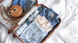 Open suitcase with clothes in it