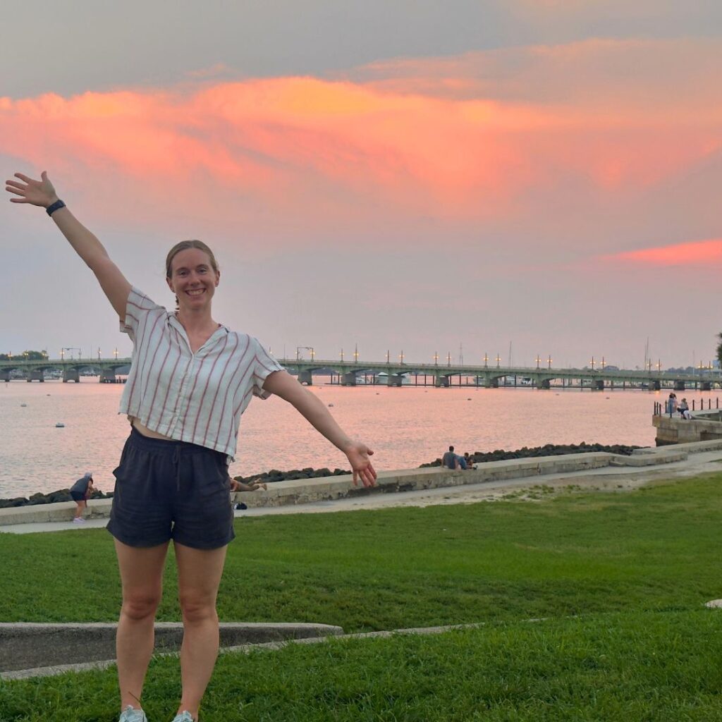 Woman by the coast in St Augustine at sunset