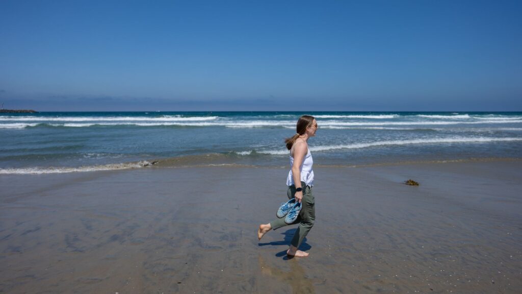 Cabo Packing List - Woman Running Down Beach