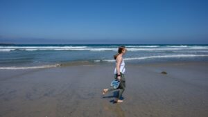 Cabo Packing List - Woman Running Down Beach