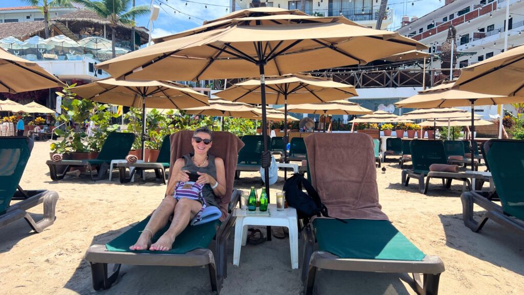 Woman lounging on the beach in Puerto Vallarta Mexico